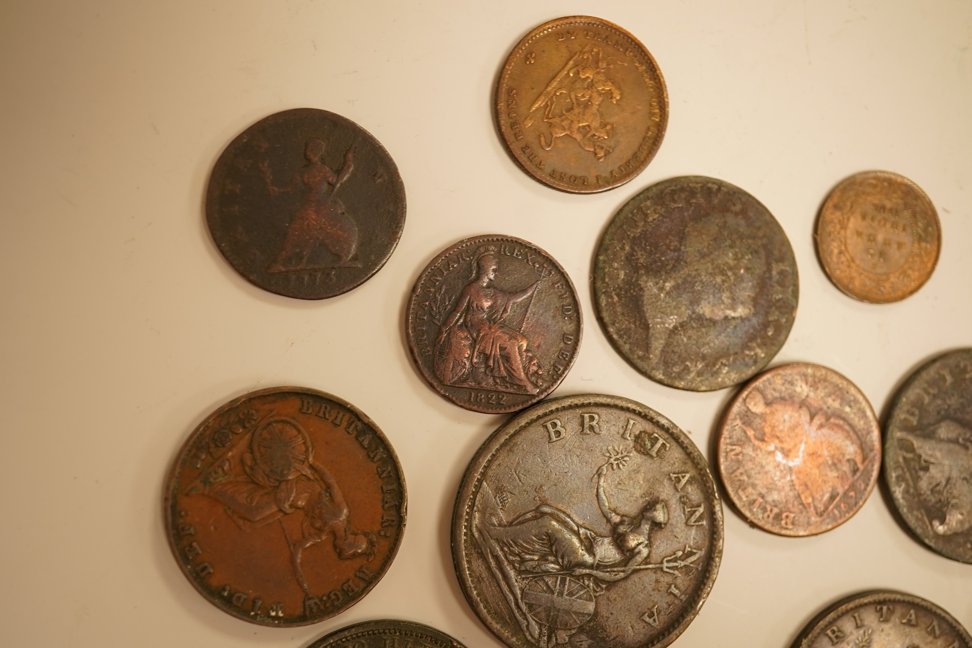 Twenty three copper coins including a William IV penny